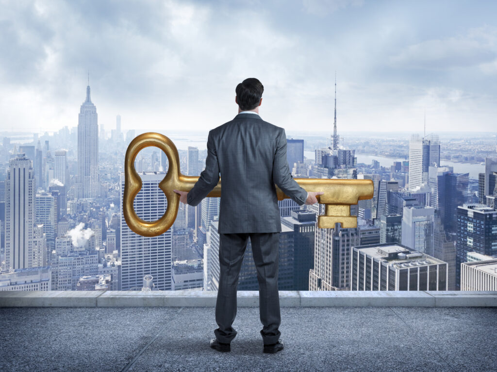 Businessman Holding The Key ToThe City