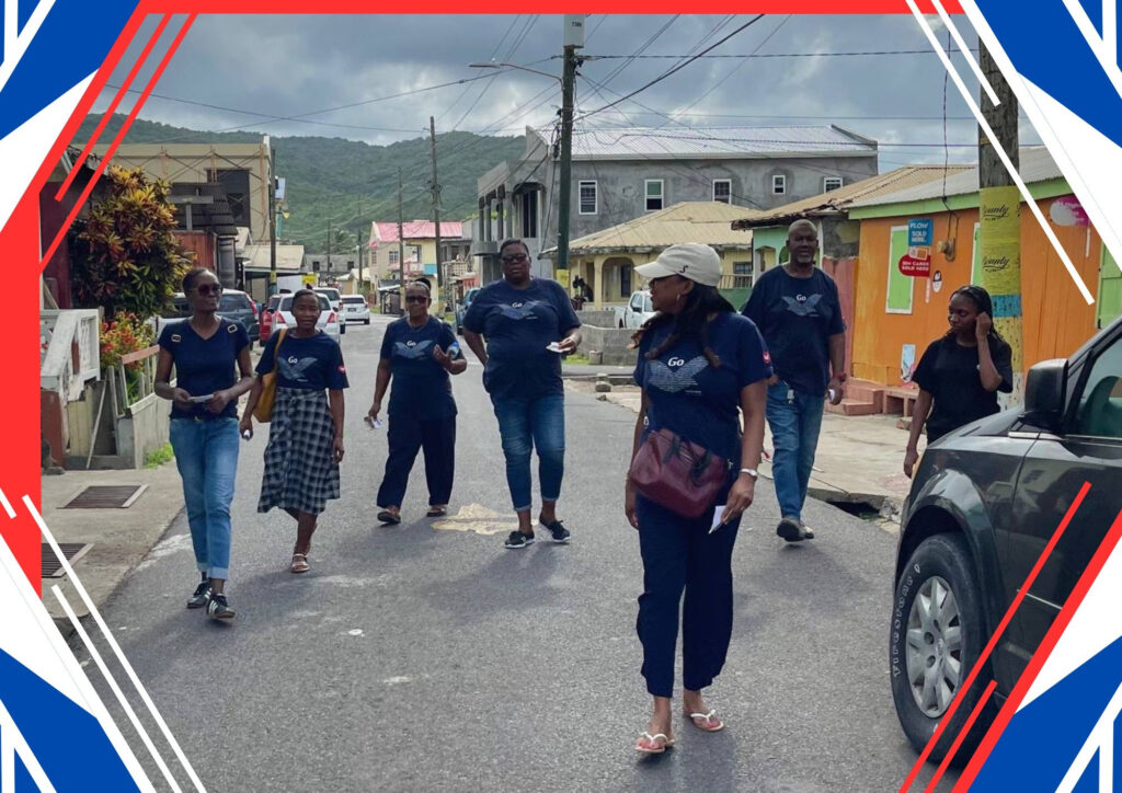 Universal Church members walking through the streets of Dennery, Saint Lucia, during community outreach